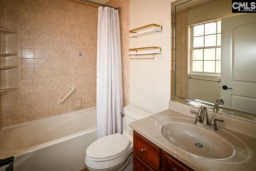 88 Running Deer Road Blythewood, SC 29016 - Photo 23 of 24 a bathroom with a sink toilet and shower