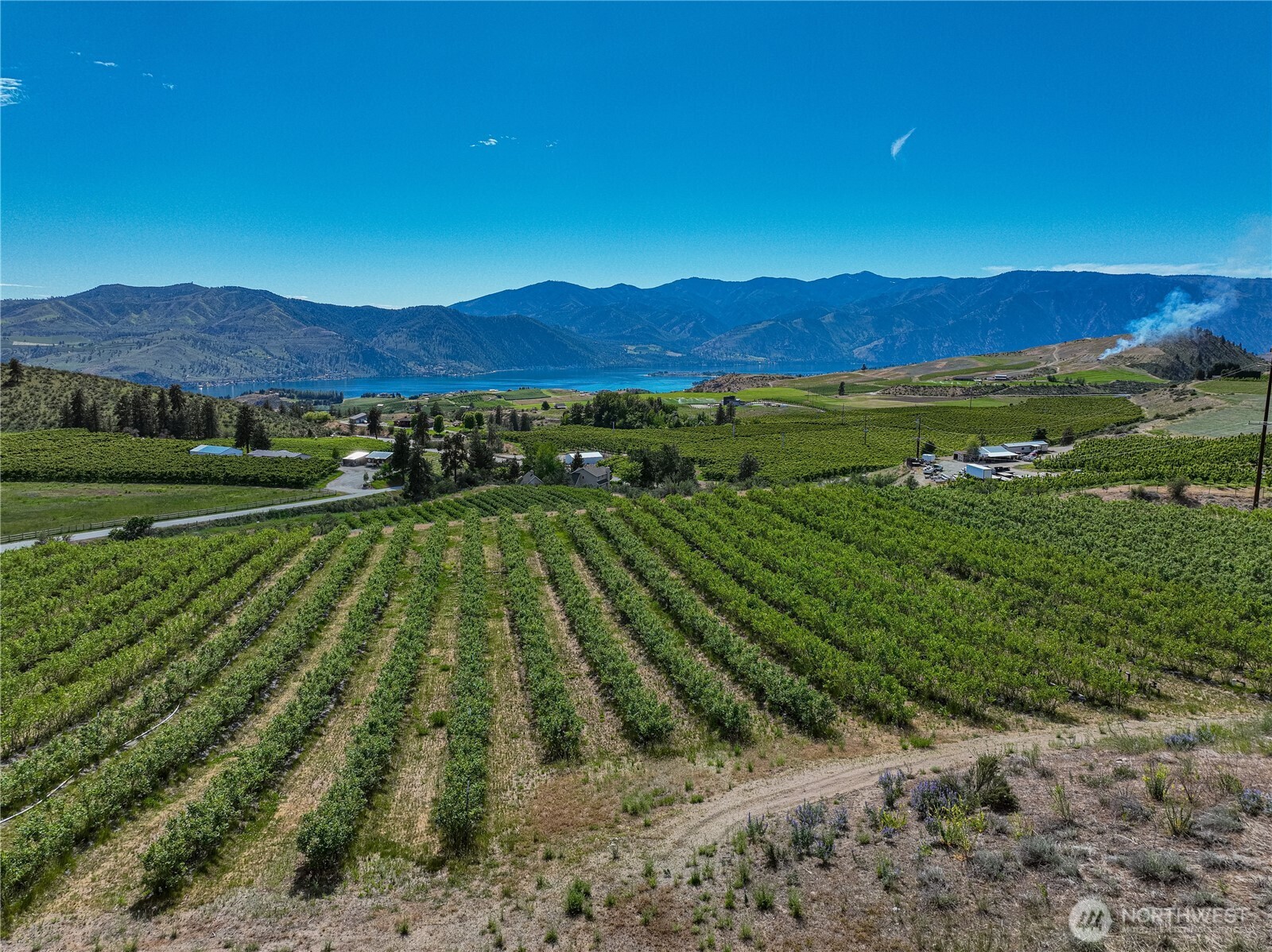 173 Chelan Ranch Road Chelan, WA 98816 - Photo 8 of 11 a view of an outdoor space and a yard