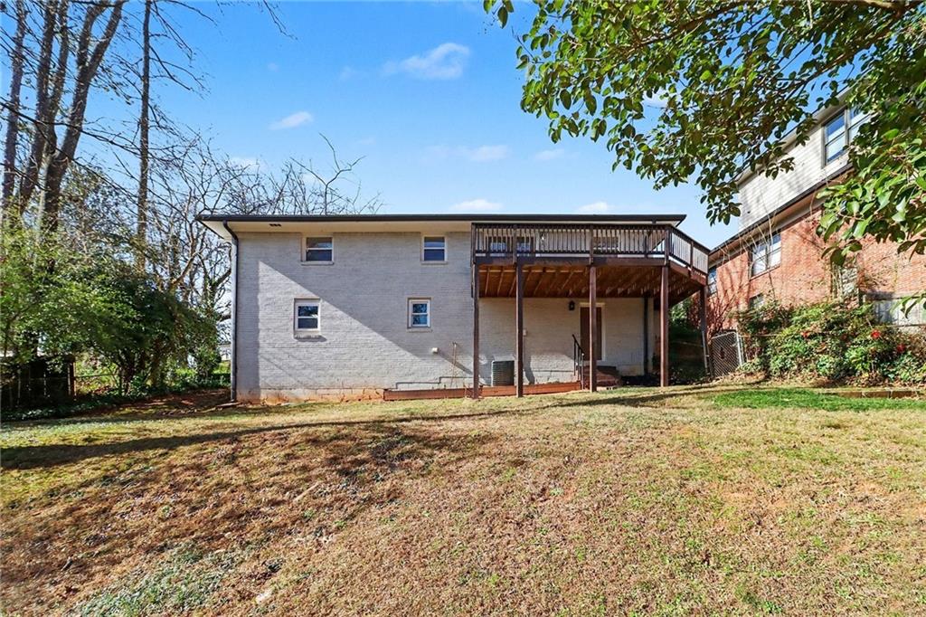 490 East Pharr Road Decatur, GA 30030 - Photo 30 of 33 a view of a house with a yard