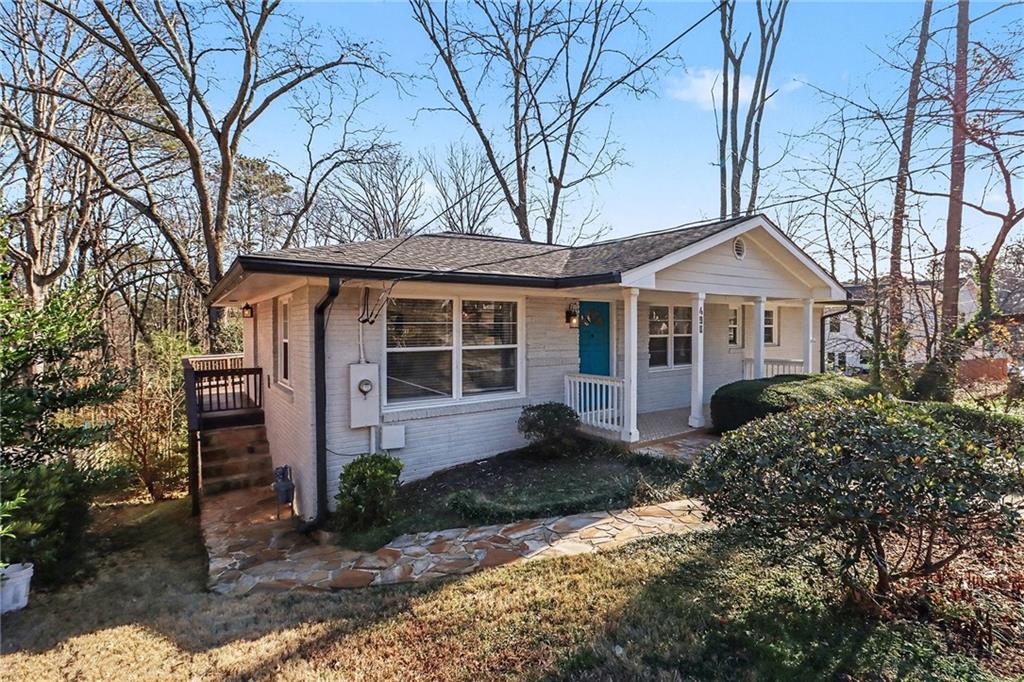 490 East Pharr Road Decatur, GA 30030 - Photo 3 of 33 a front view of a house with garden