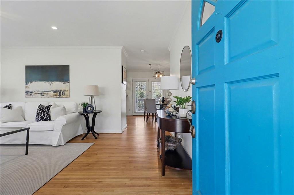 490 East Pharr Road Decatur, GA 30030 - Photo 5 of 33 a living room with furniture and a wooden floor