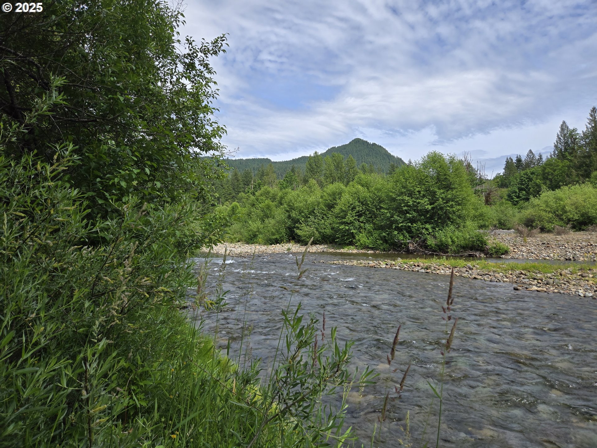 a view of an outdoor space with mountain view