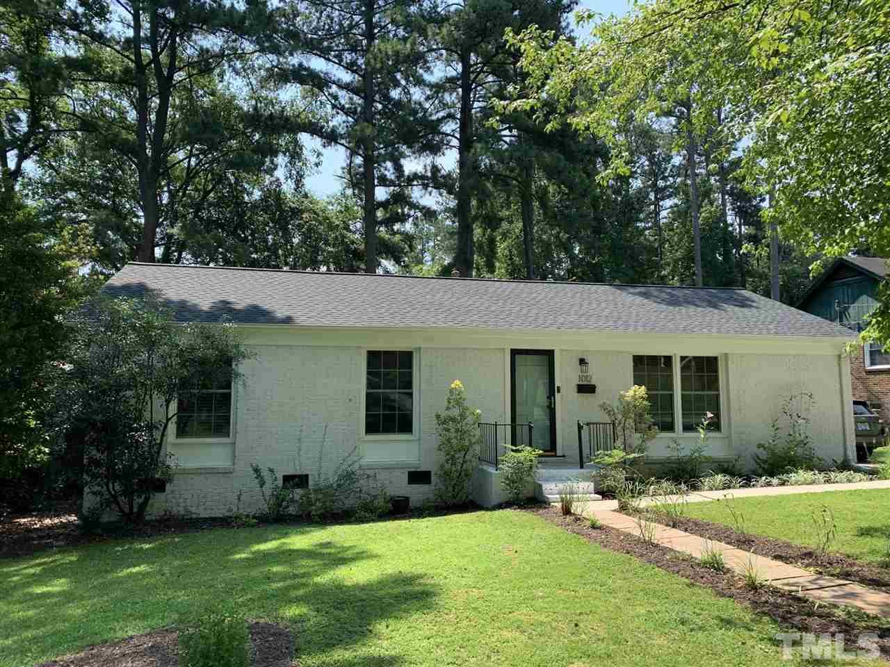 1012 Belfast Drive Raleigh, NC 27610 - Photo 1 of 30 a view of a house with a yard and plants