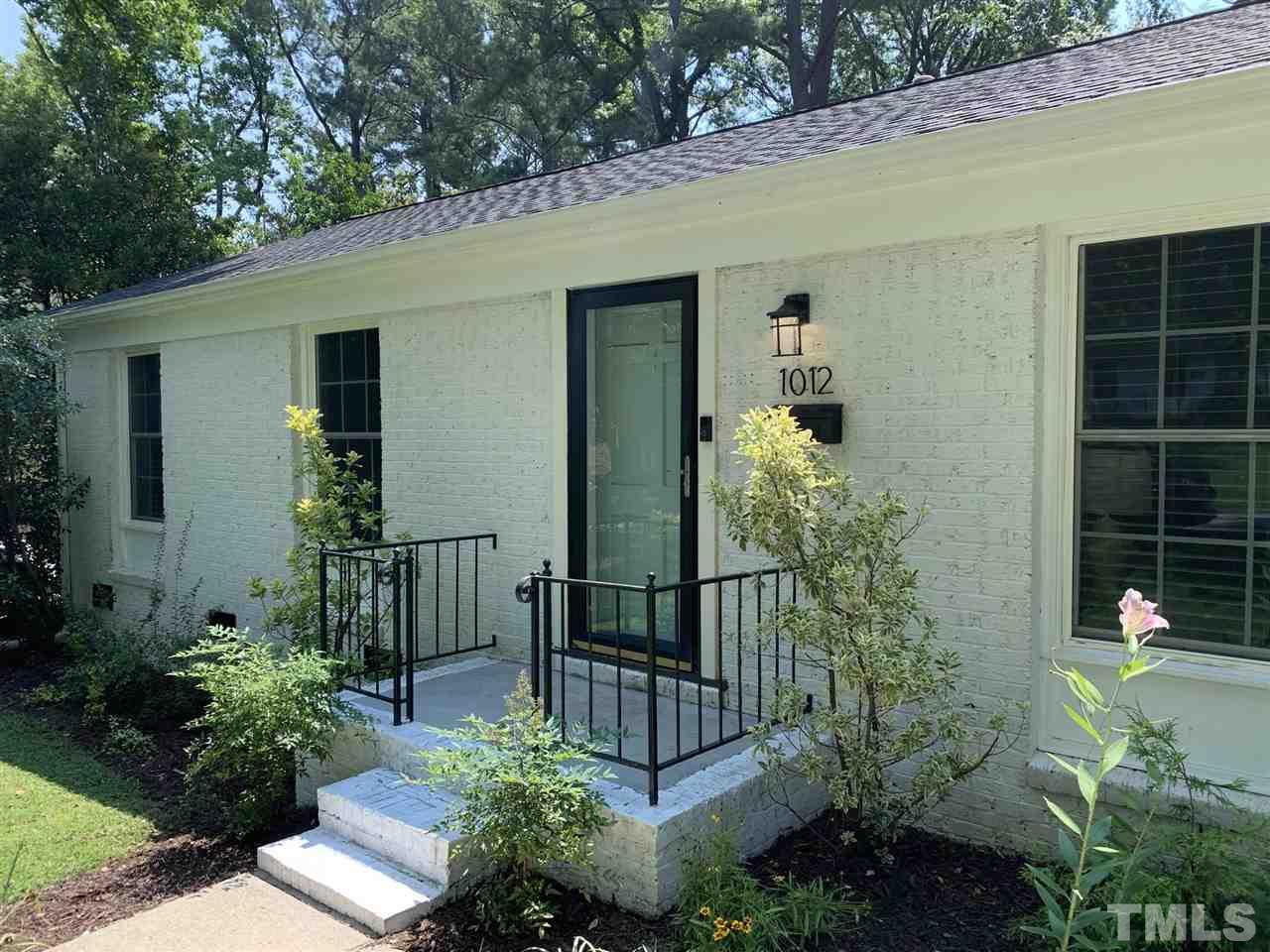 1012 Belfast Drive Raleigh, NC 27610 - Photo 3 of 30 a view of a house with a small garden