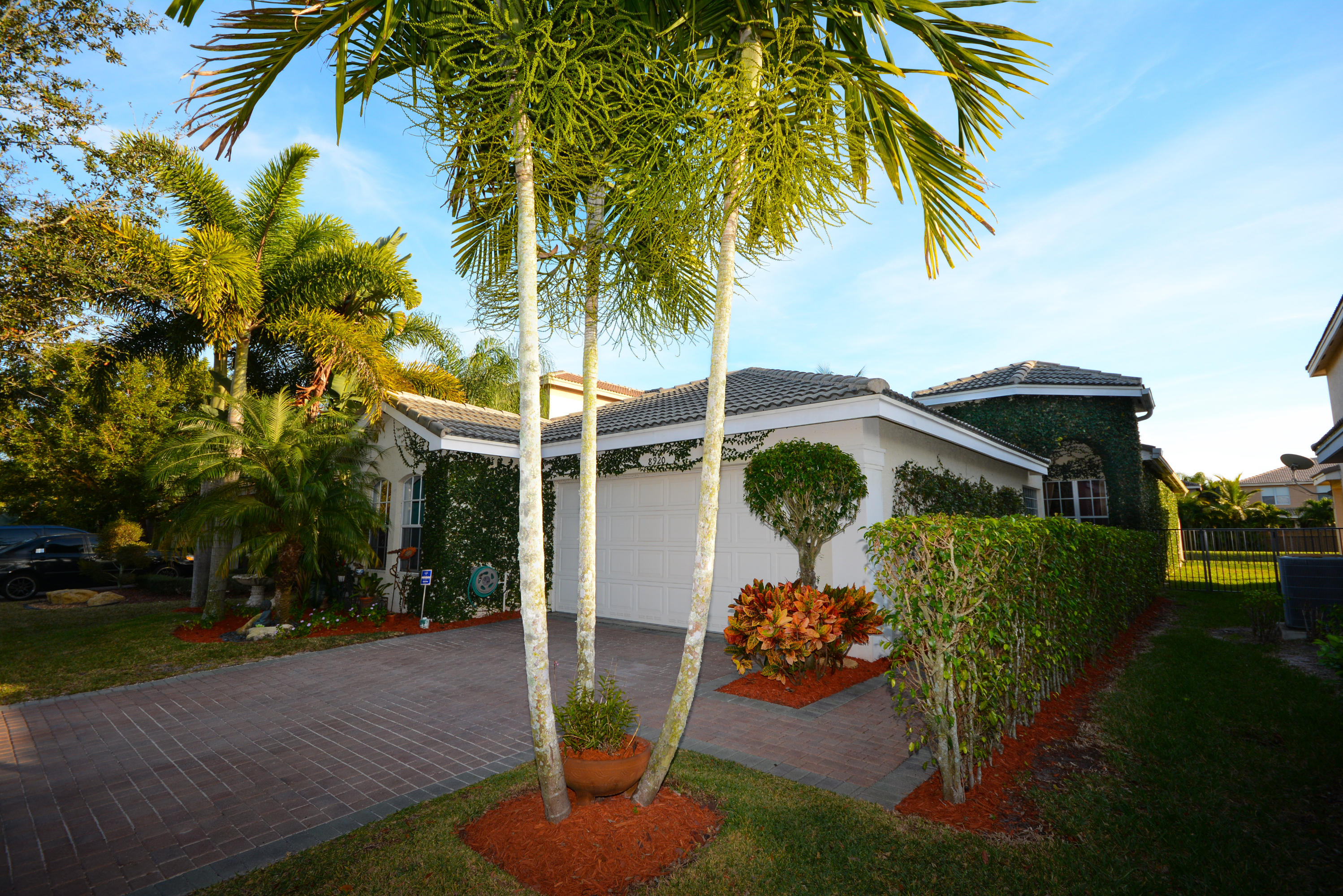 8920 Chestnut Ridge Way Boynton Beach, FL 33473 - Photo 2 of 29 Front of Home
