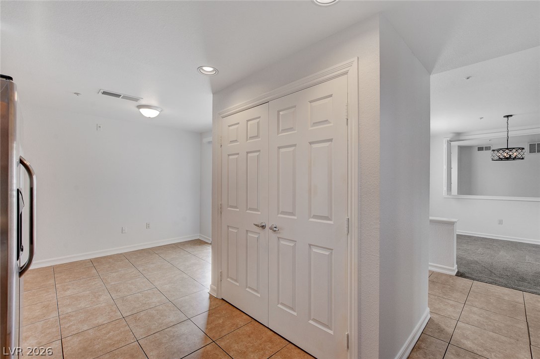230 East Flamingo Road, Unit 404 Las Vegas, NV 89169 - Photo 1 of 34 Gleaming tile flooring and a neutral color palette enhance this versatile interior space.