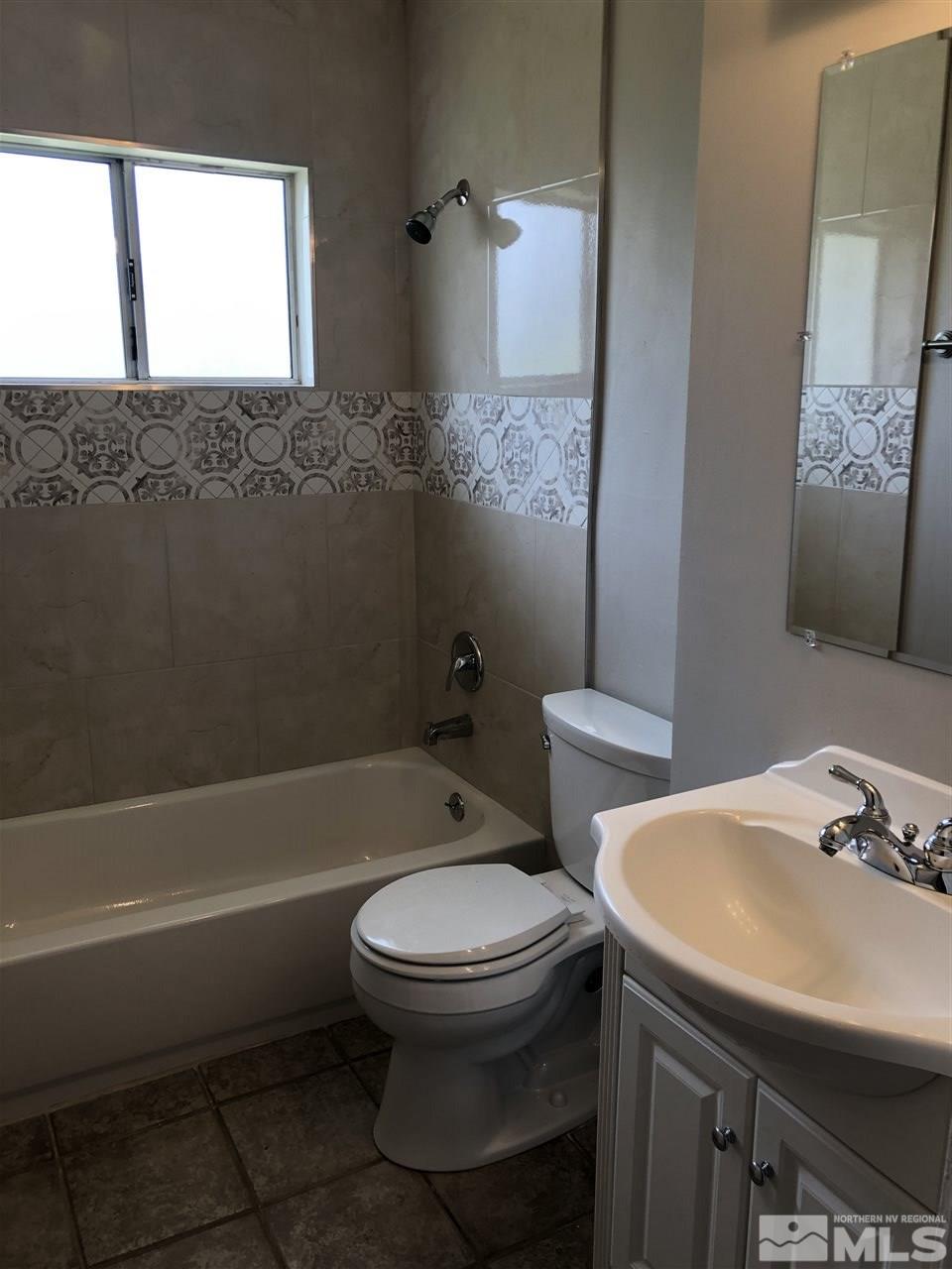 1995 Arcane Avenue Reno, NV 89503 - Photo 9 of 9 a bathroom with a sink toilet and shower