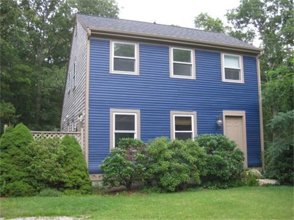 7 Christopher Hollow Road Sandwich, MA 02563 - Photo 1 of 1 a front view of a house with garden