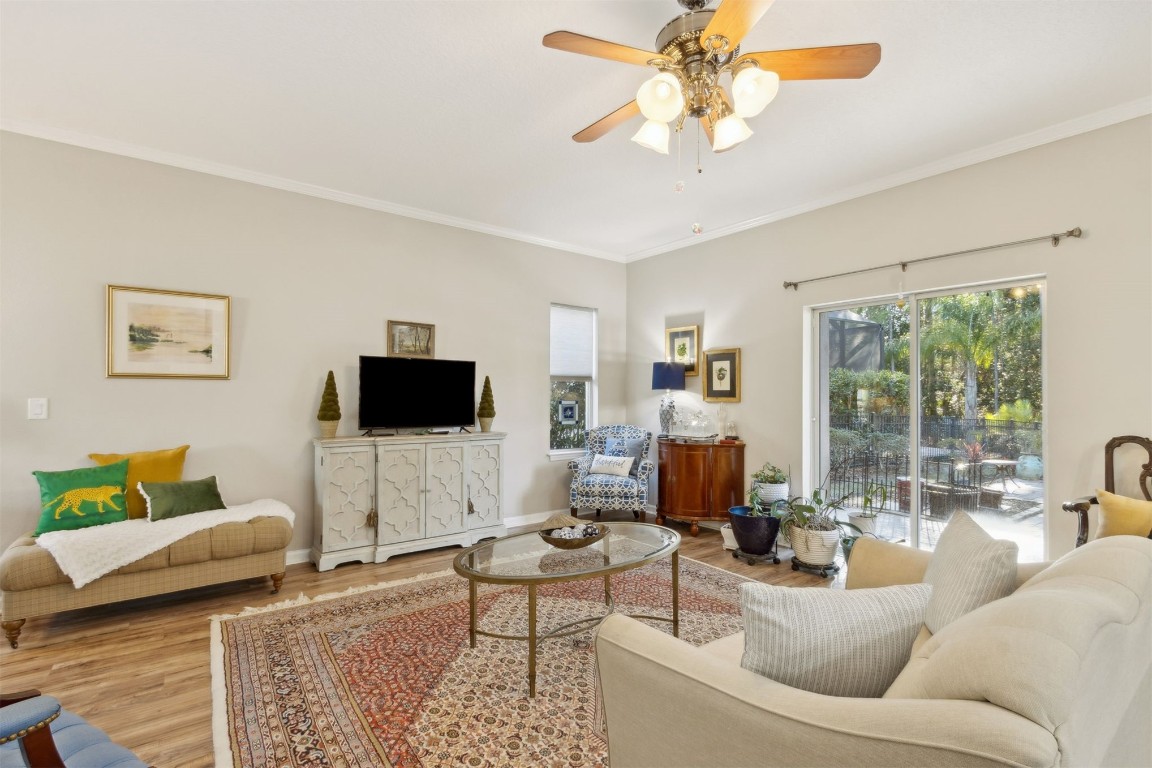 95275 Poplar Way Fernandina Beach, FL 32034 - Photo 3 of 38 a living room with furniture and a flat screen tv