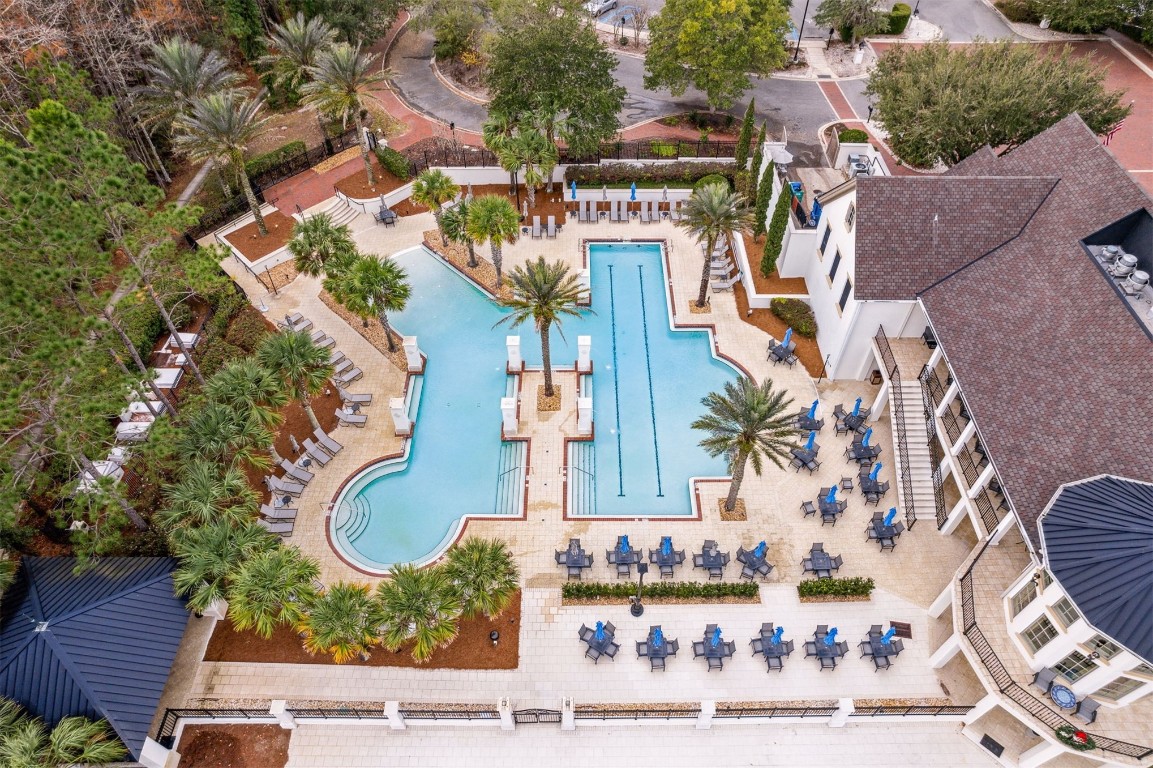 95275 Poplar Way Fernandina Beach, FL 32034 - Photo 32 of 38 an aerial view of a residential apartment building with a yard and outdoor seating