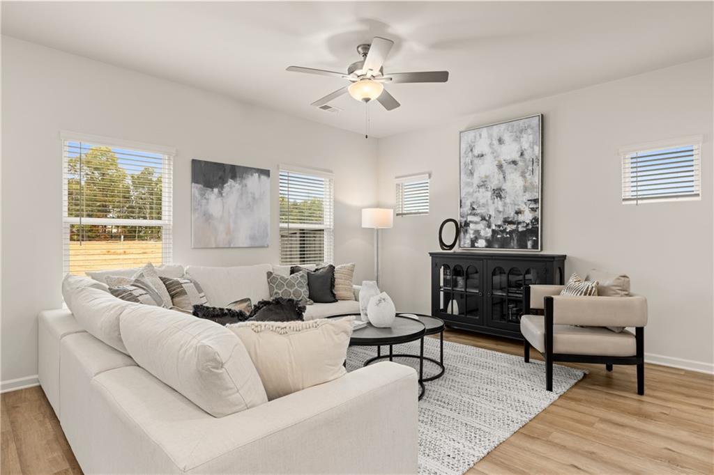 1035 Merritt Drive, Unit 94 Villa Rica, GA 30180 - Photo 12 of 49 a living room with furniture and a large window