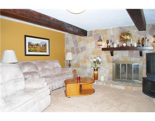 141 Glendale Road Beaver Falls, PA 15010 - Photo 11 of 18 Family Room. One floor below the main floor. Stone fireplace, nice natural light from windows, closets, access to laundry room and 2nd bathroom. Steel door to next lower level (garage/potential gameroom)