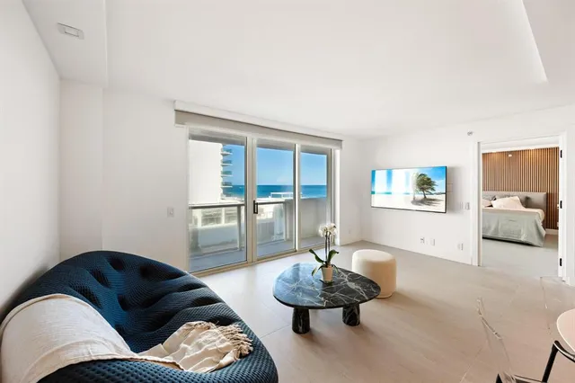 a living room with furniture and a couch