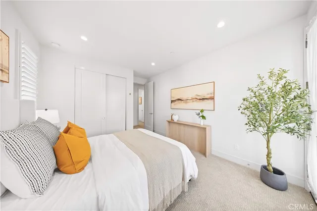 a view of a patio with a table and chairs