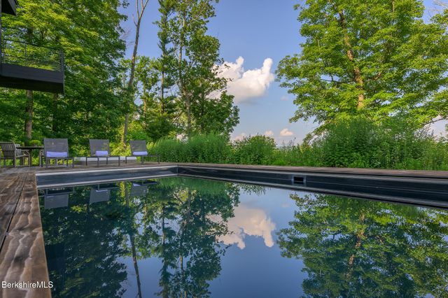 a view of a balcony with lake view