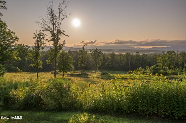 a view of a lake with a mountain in the background
