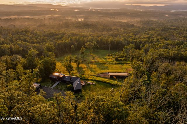view of a city with mountains in the background