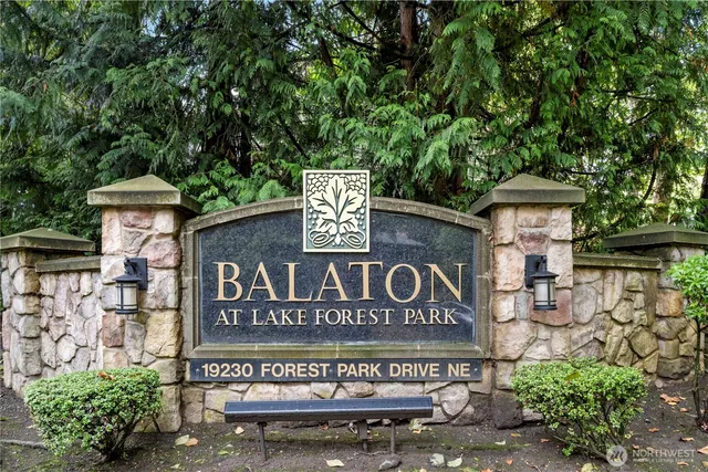 a view of outdoor space with signage and flags
