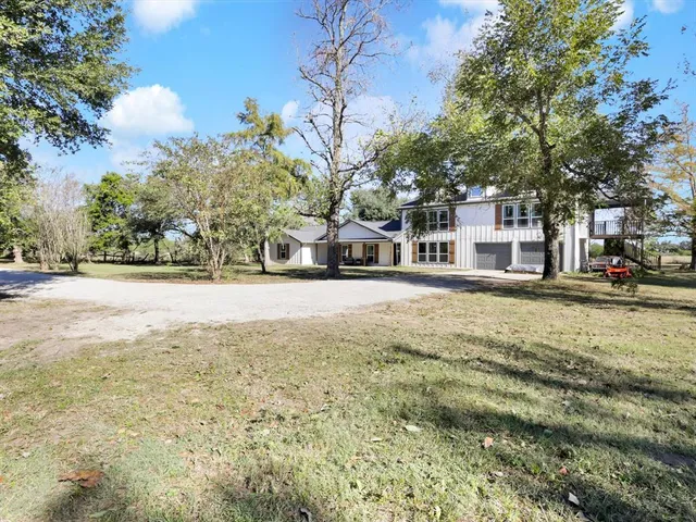 a view of road with residential houses