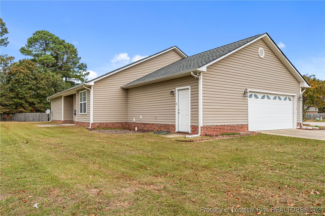 117 Usher Court Raeford, NC 28376 - Photo 12 of 48 a view of a backyard with a garden