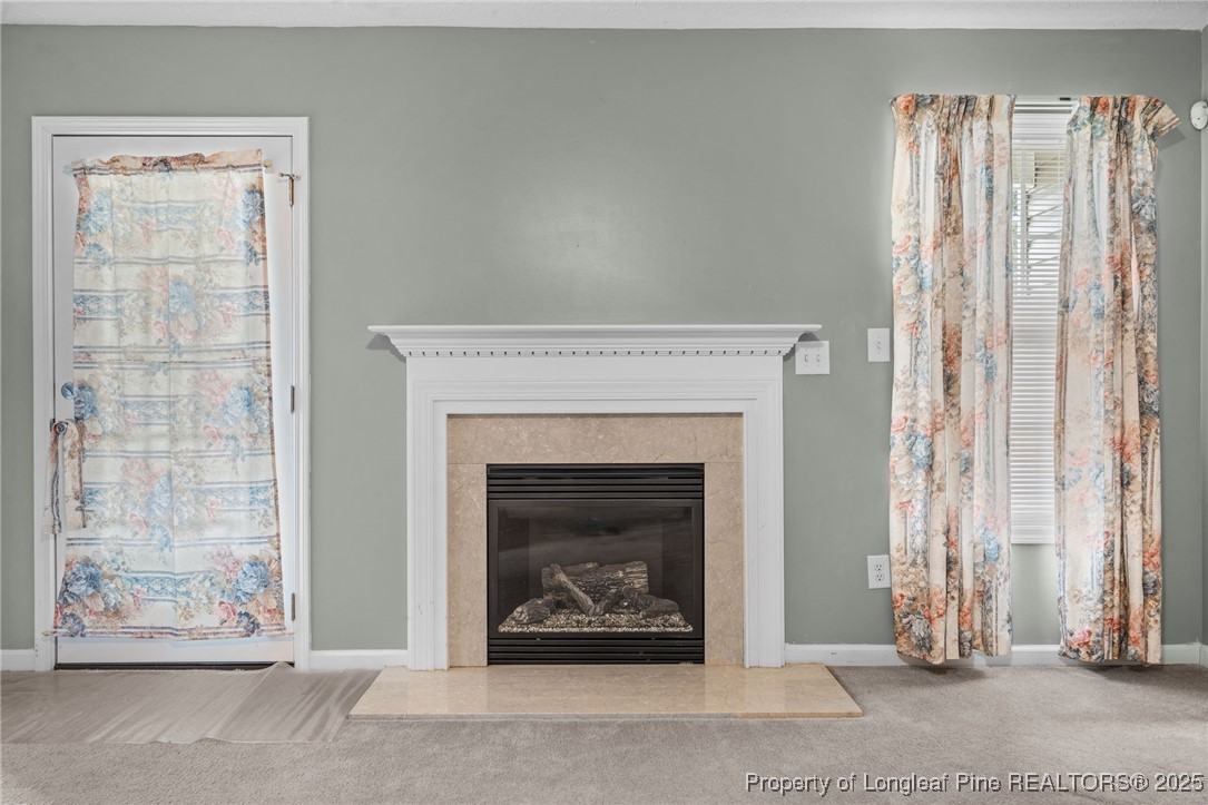 117 Usher Court Raeford, NC 28376 - Photo 35 of 48 a living room with furniture and a fireplace