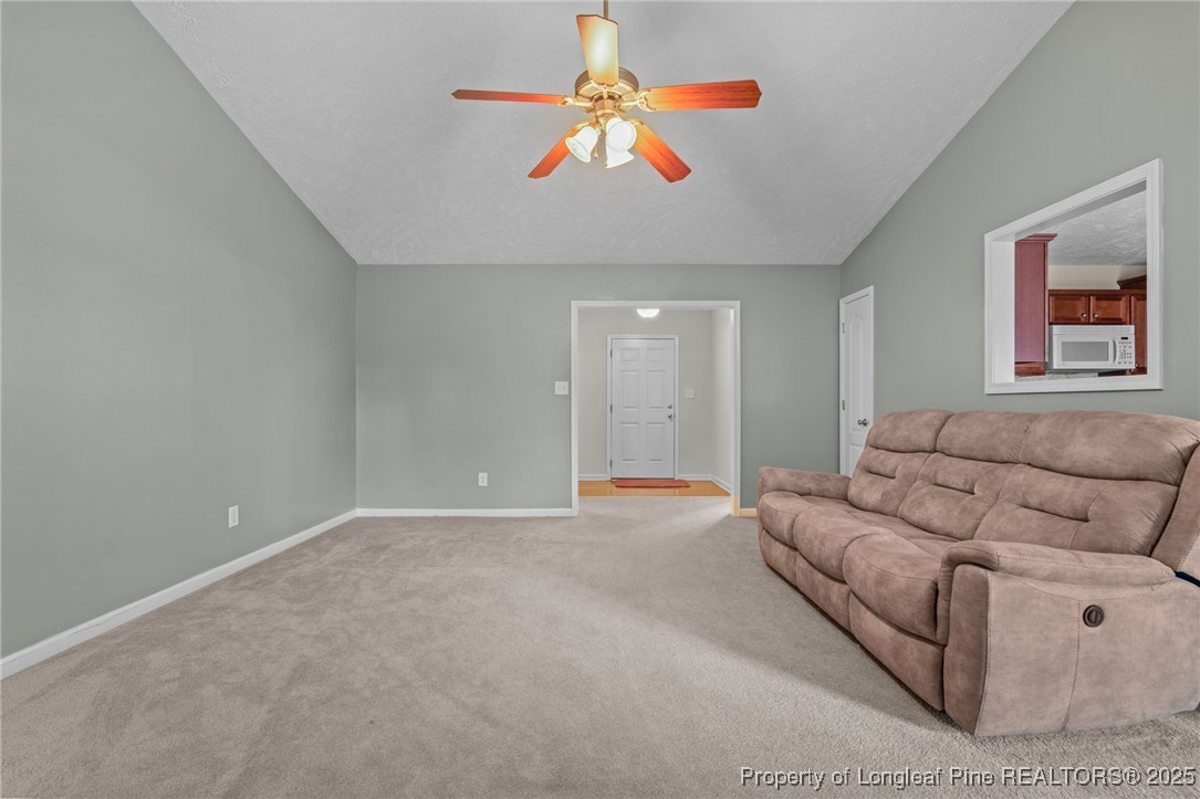 117 Usher Court Raeford, NC 28376 - Photo 38 of 48 a living room with furniture and a ceiling fan