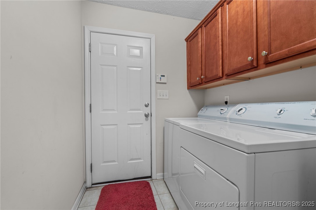 117 Usher Court Raeford, NC 28376 - Photo 39 of 48 a utility room with dryer and washer