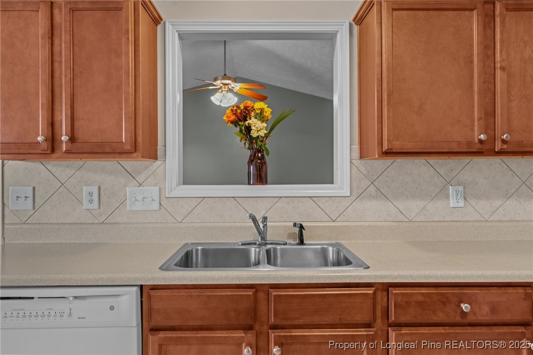 117 Usher Court Raeford, NC 28376 - Photo 48 of 48 a bathroom with a sink and a mirror