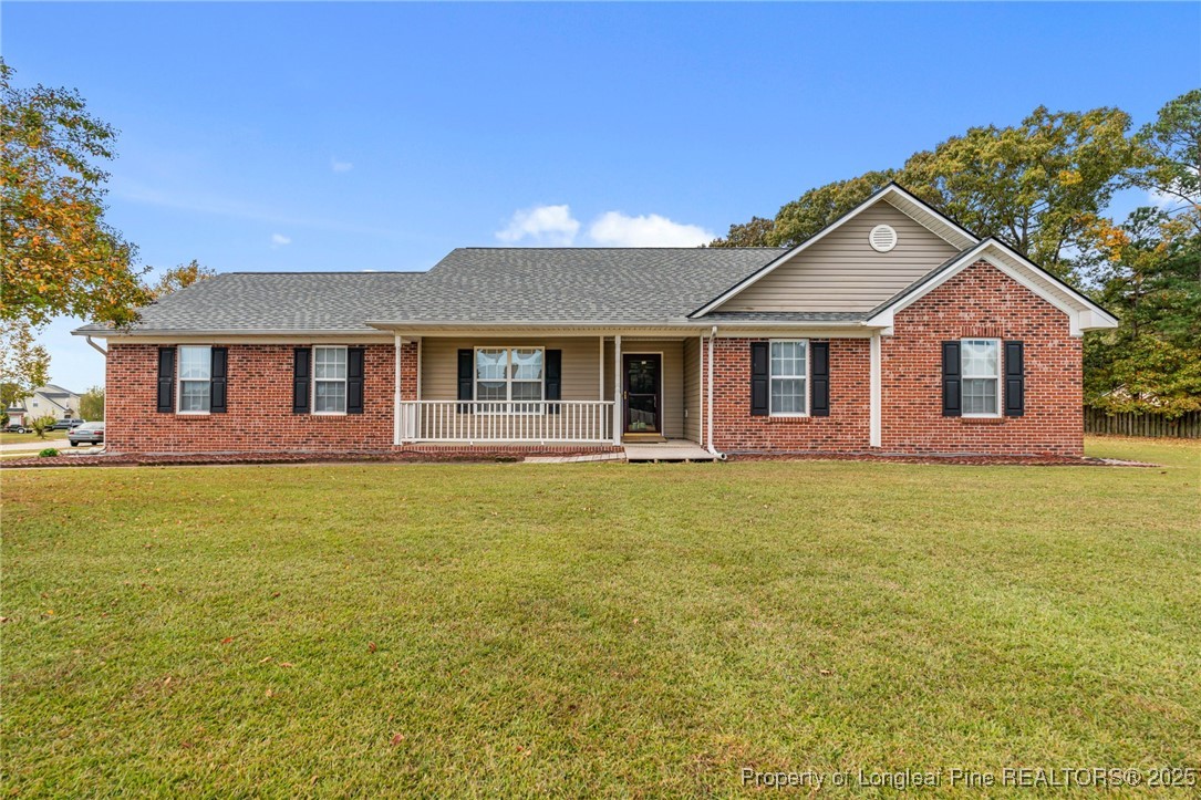 117 Usher Court Raeford, NC 28376 - Photo 8 of 48 a front view of a house with garden