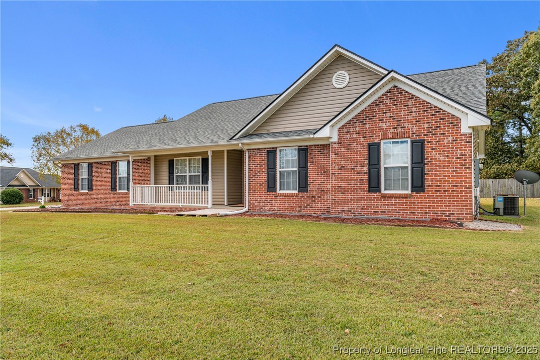117 Usher Court Raeford, NC 28376 - Photo 9 of 48 a front view of a house with garden