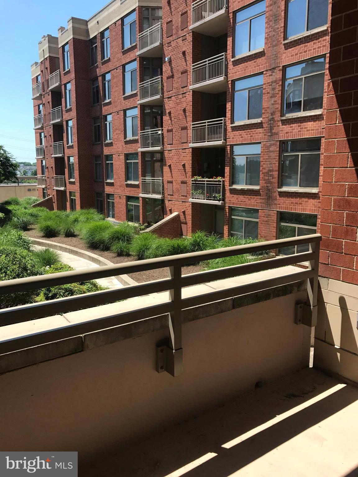 3600 South Glebe Road, Unit 330W Arlington, VA 22202 - Photo 13 of 20 a front view of a building with a street