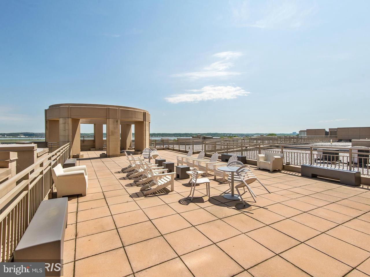 3600 South Glebe Road, Unit 330W Arlington, VA 22202 - Photo 17 of 20 a view of roof deck with lounge chairs