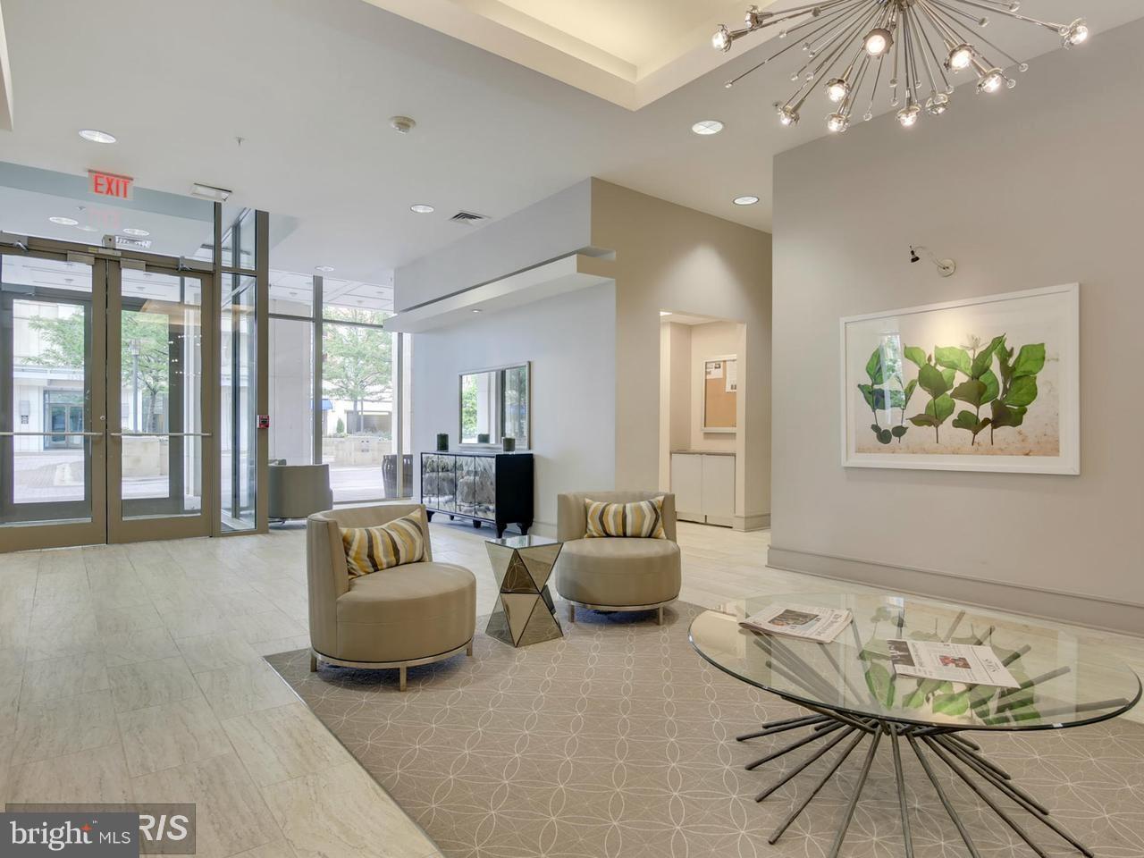 3600 South Glebe Road, Unit 330W Arlington, VA 22202 - Photo 18 of 20 a living room with furniture and a large window