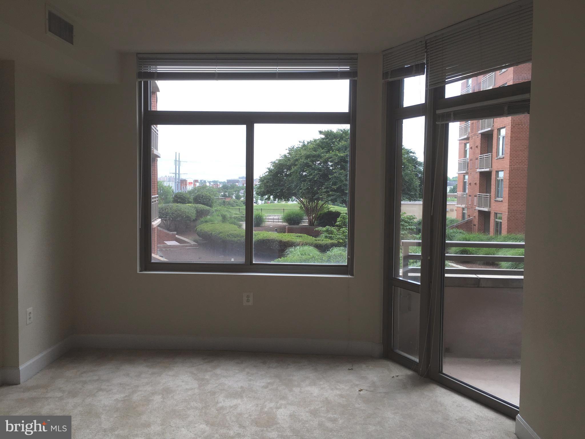 3600 South Glebe Road, Unit 330W Arlington, VA 22202 - Photo 5 of 20 an empty room with a window