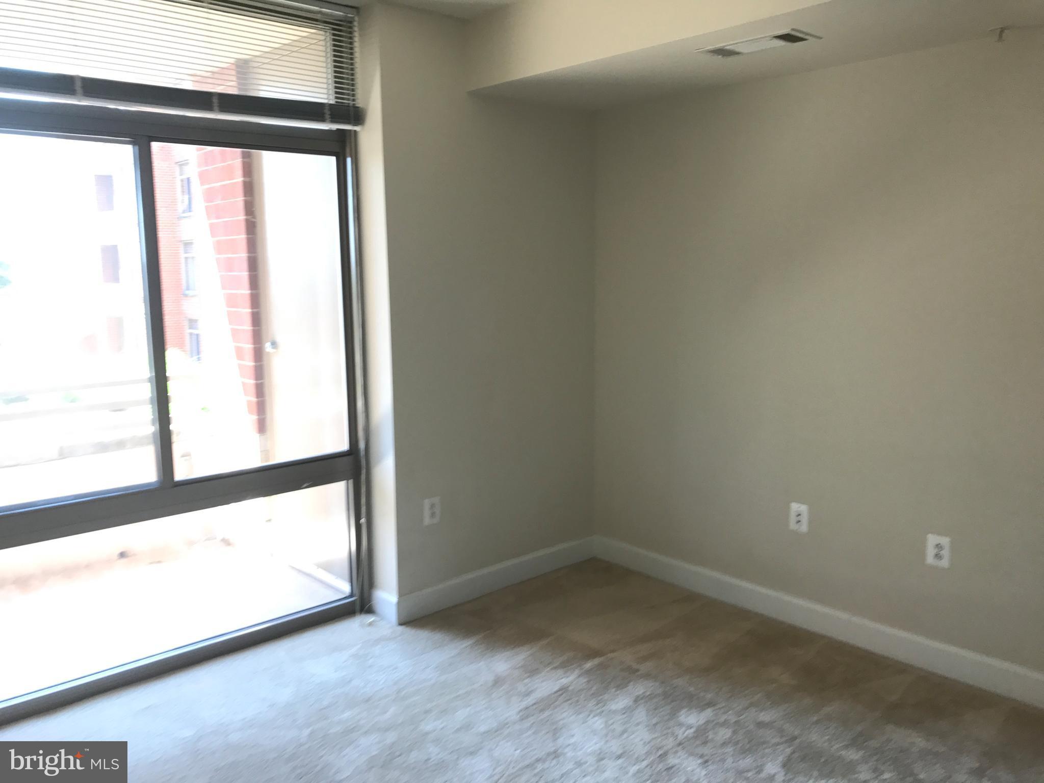 3600 South Glebe Road, Unit 330W Arlington, VA 22202 - Photo 7 of 20 a view of empty room with window