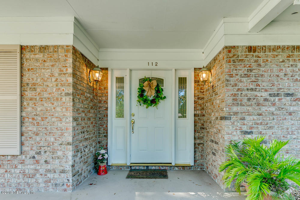 112 Faun Road St. Augustine, FL 32086 - Photo 3 of 36 a view of entryway with flower pots