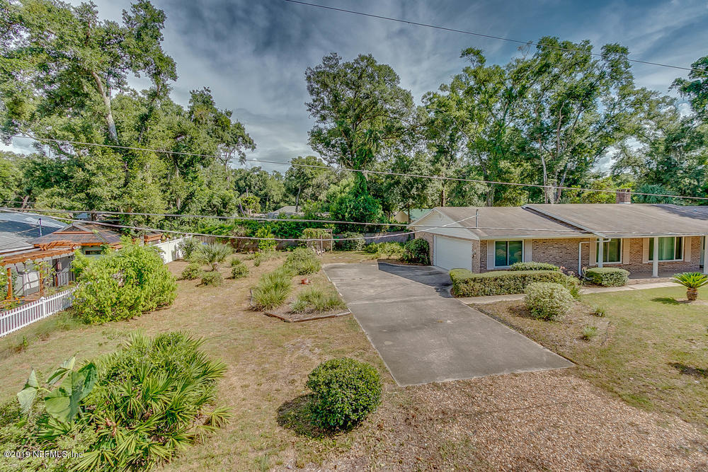 112 Faun Road St. Augustine, FL 32086 - Photo 35 of 36 an aerial view of a house with a yard and lake view
