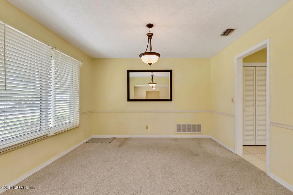 112 Faun Road St. Augustine, FL 32086 - Photo 8 of 36 a view of a room with gym equipment
