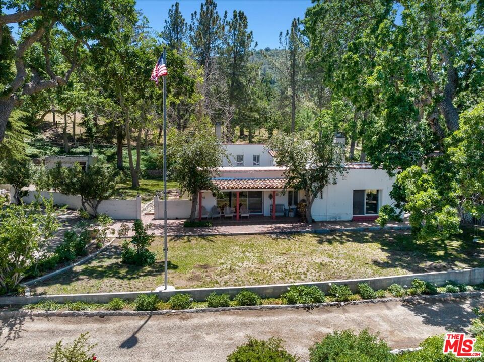 31008 Pine Canyon Road Lake Hughes, CA 93532 - Photo 3 of 29 front view of a house with a yard