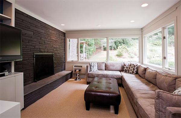 60 Beverly Road Brookline, MA 02467 - Photo 6 of 8 a living room with furniture a large window and a fireplace