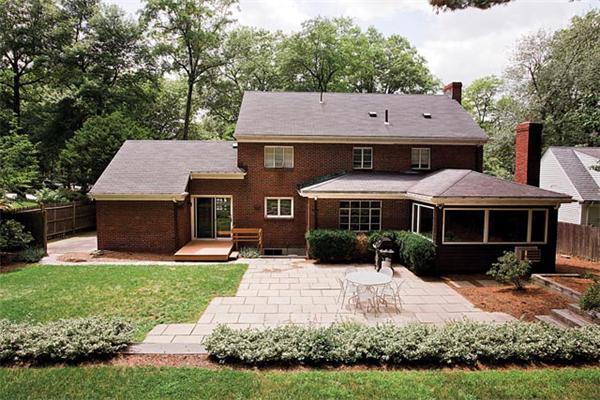 60 Beverly Road Brookline, MA 02467 - Photo 7 of 8 a aerial view of a house with a yard table and chairs