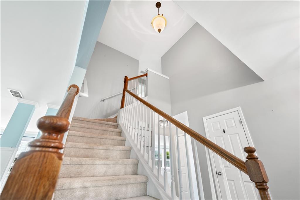 871 New Liberty Way Braselton, GA 30517 - Photo 17 of 47 a view of entryway and hall with wooden floor
