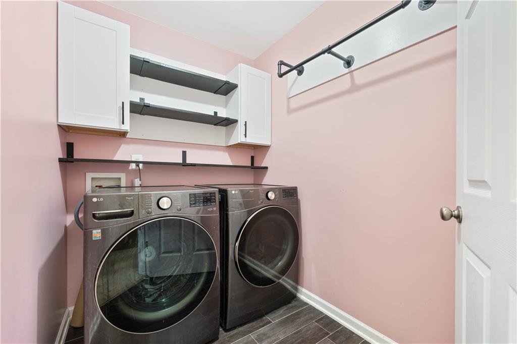 871 New Liberty Way Braselton, GA 30517 - Photo 20 of 47 a utility room with dryer and washer