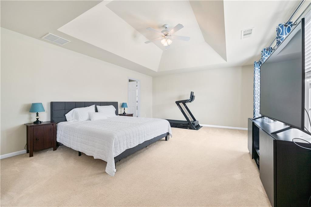 871 New Liberty Way Braselton, GA 30517 - Photo 23 of 47 a bedroom with bed and window
