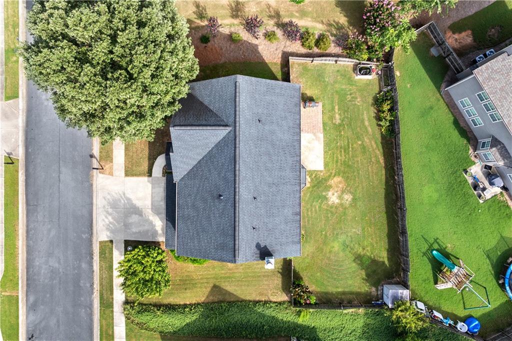 871 New Liberty Way Braselton, GA 30517 - Photo 40 of 47 an aerial view of a house having yard