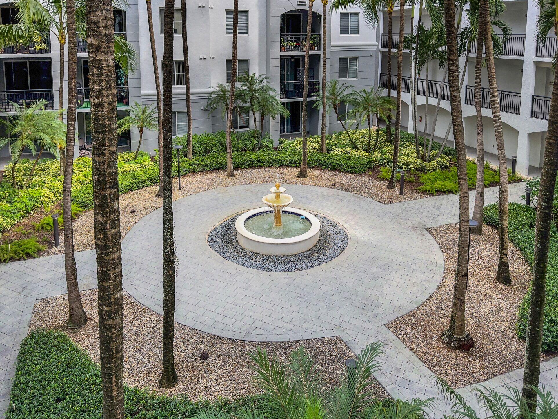 1660 Renaissance Commons Boulevard, Unit 2326 Boynton Beach, FL 33426 - Photo 35 of 58 Courtyard view from unit