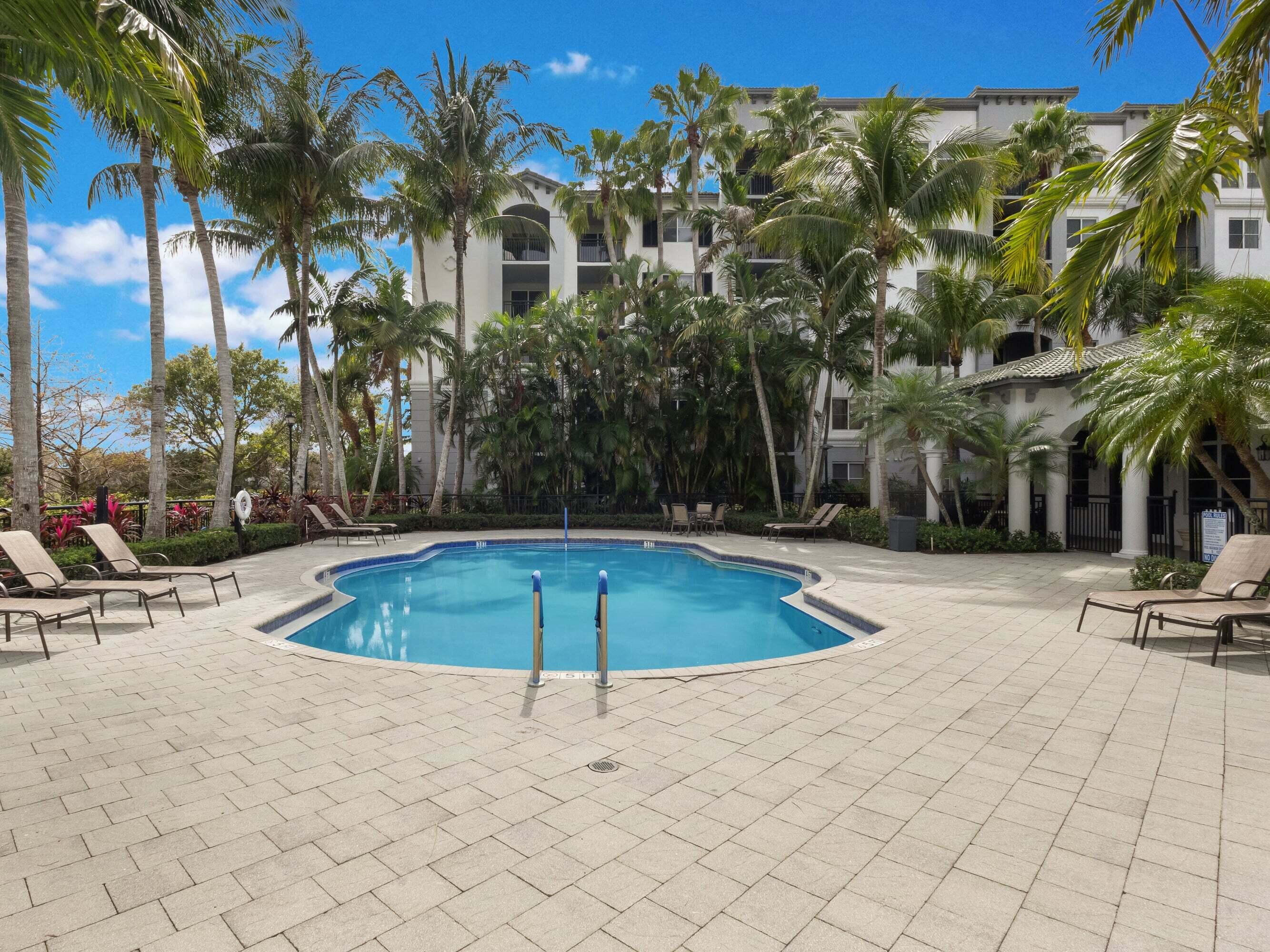 1660 Renaissance Commons Boulevard, Unit 2326 Boynton Beach, FL 33426 - Photo 49 of 58 Clubhouse Pool