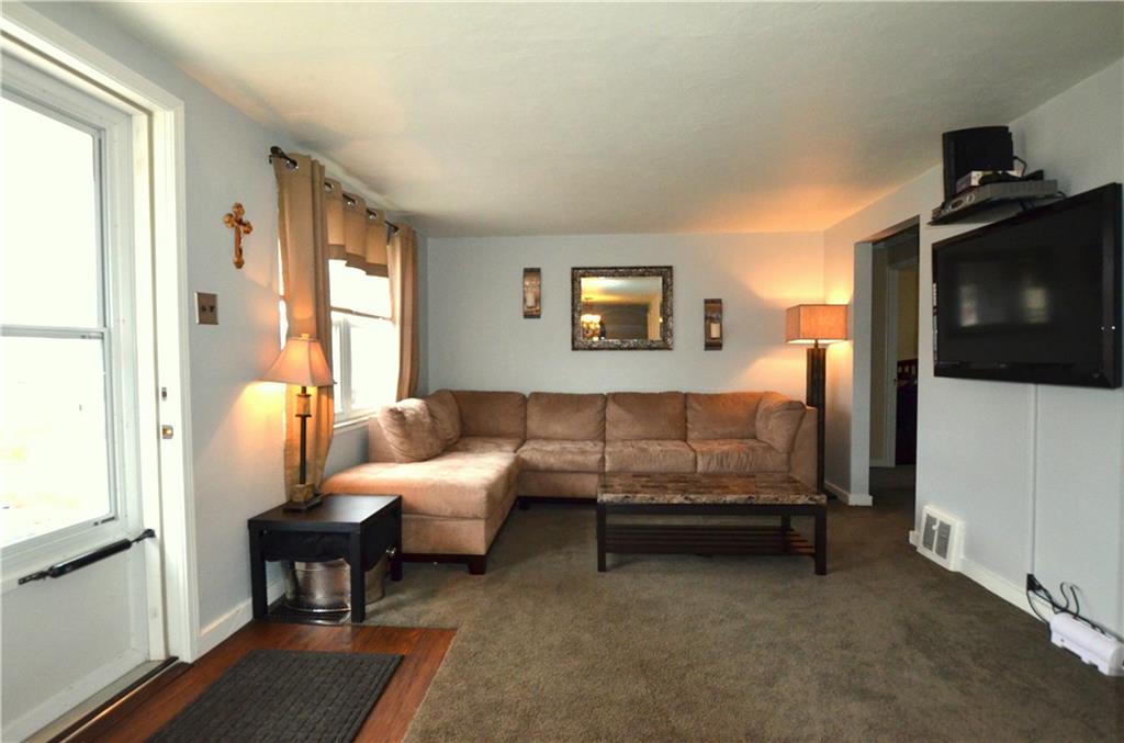 255 Castle Road Castle Shannon, PA 15234 - Photo 3 of 14 Living room with newer carpet and popular neutral gray walls.