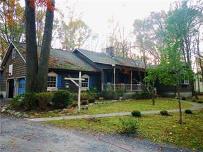 265 Tillson Lake Road Wallkill, NY 12589 - Photo 1 of 1 a front view of a house with a yard