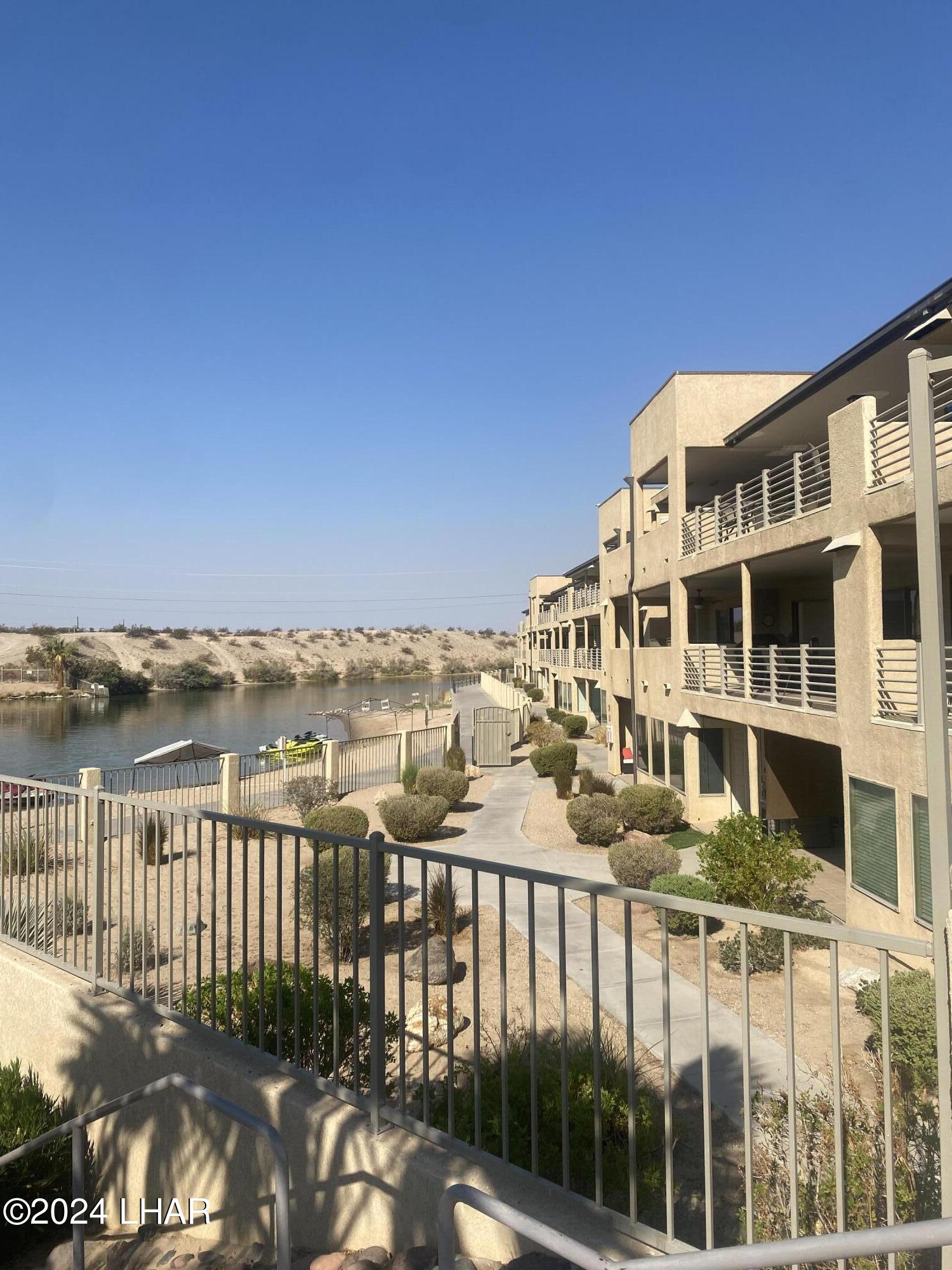 94 London Bridge Road, Unit 108 Lake Havasu City, AZ 86403 - Photo 3 of 38 a view of a building from a balcony